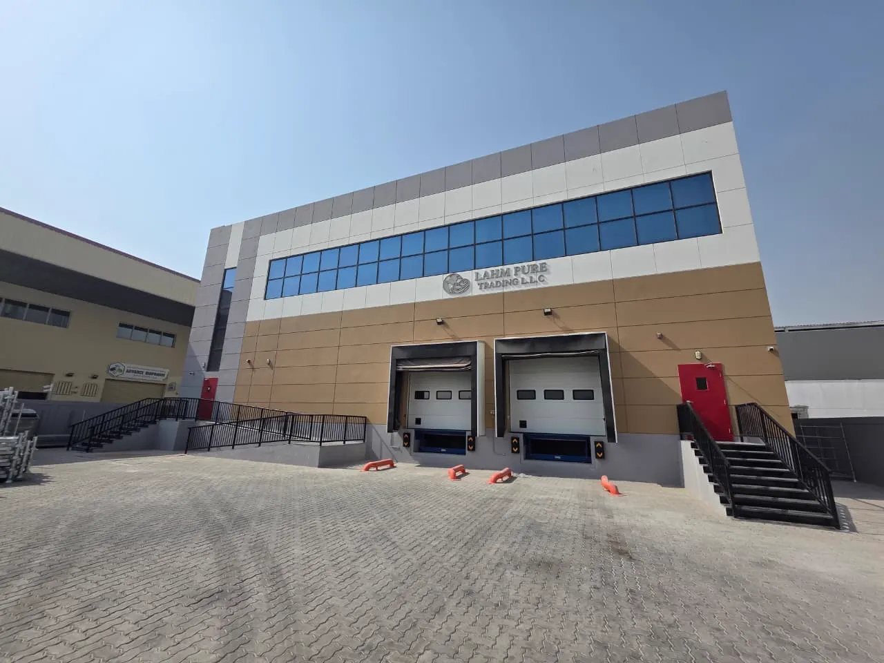 LAHM PURE TRADING L.L.C facility in Warsan 2, Dubai with two temperature-sealed loading docks